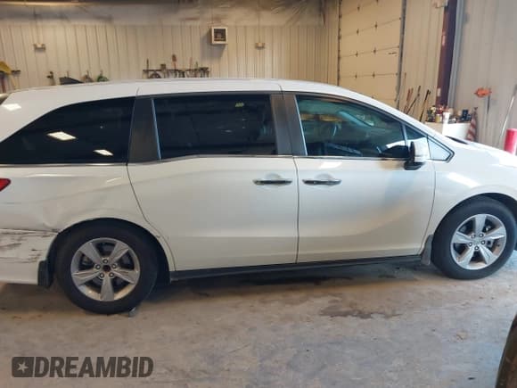 ✅ 2020 Honda Odyssey EX-L • VIN: 5FNRL6H71LB056828 • Lot: 43103218. Listed on IAAI with 68,891 mi. Free auction sales archive from the USA and detailed vehicle history report at DreamBid. Image 13.