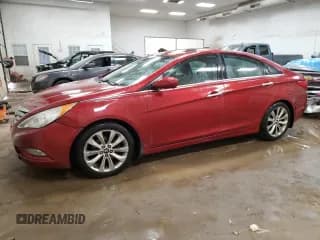 ✅ 2013 Hyundai Sonata SE • VIN: 5NPEC4AC9DH780747 • Lot: 69197404. Listed on Copart with 86,085 mi. Free auction sales archive from the USA and detailed vehicle history report at DreamBid. Image 1.
