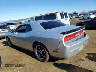 ✅ 2009 Dodge Challenger SE • VIN: 2B3LJ44V59H561537 • Lot: 86720334. Wystawiony na Copart z przebiegiem 163 233 mil. Bezpłatny archiwum sprzedaży aukcyjnych z USA i szczegółowy raport historii pojazdu na DreamBid. Zdjęcie 2.