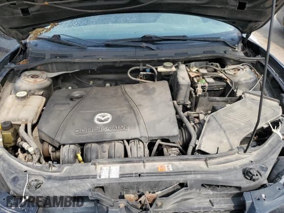 ✅ 2005 Mazda 3 i • VIN: JM1BK12F151328149 • Лот: 67232845. Опубликован ранее на Copart с пробегом 239 173 миль. Бесплатный доступ к архиву аукционных продаж из США и подробный отчёт об истории автомобиля на DreamBid. Изображение 11.