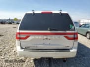 ✅ 2015 Lincoln Navigator • VIN: 5LMJJ3JT8FEJ03084 • Lot: 84768735. Wystawiony na Copart z przebiegiem 163 136 mil. Bezpłatny archiwum sprzedaży aukcyjnych z USA i szczegółowy raport historii pojazdu na DreamBid. Zdjęcie 6.