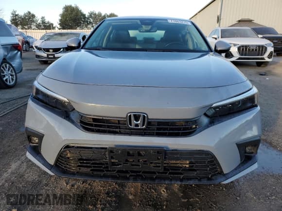 ✅ 2022 Honda Civic Touring • VIN: 2HGFE1F94NH003303 • Lot: 71663215. Wystawiony na Copart z przebiegiem 114 181 mil. Bezpłatny archiwum sprzedaży aukcyjnych z USA i szczegółowy raport historii pojazdu na DreamBid. Zdjęcie 5.