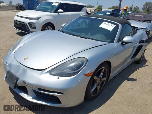 ✅ 2017 Porsche 718 Boxster • VIN: WP0CA2A80HS220216 • Lot: 42658120. Listed on IAAI with 54,116 mi. Free auction sales archive from the USA and detailed vehicle history report at DreamBid. Image 18.