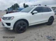✅ 2017 Volkswagen Touareg Wolfsburg Edition • VIN: WVGRF7BP2HD004883 • Lot: 67345445. Listed on Copart with 166,047 mi. Free auction sales archive from the USA and detailed vehicle history report at DreamBid. Image 1.