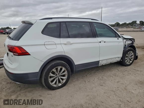 ✅ 2018 Volkswagen Tiguan S • VIN: 3VV1B7AX4JM079823 • Lot: 95833855. Listed on Copart with 66,522 mi. Free auction sales archive from the USA and detailed vehicle history report at DreamBid. Image 3.