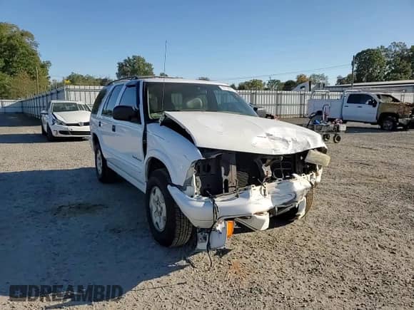2000 Chevrolet Blazer LT with VIN 1GNDT13WXY2236550, listed as a Copart auction lot 77170574 with 221,994 mi miles and Salvage title. Bid and sale history available at DreamBid. Image 12.