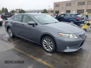 ✅ 2013 Lexus ES 300h • VIN: JTHBW1GG0D2029247 • Lot: 43240456. Listed on IAAI with 129,760 mi. Free auction sales archive from the USA and detailed vehicle history report at DreamBid. Image 1.