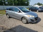 ✅ 2013 Mazda 5 Sport • VIN: JM1CW2BL5D0161531 • Lot: 65734385. Listed on Copart with 103,340 mi. Free auction sales archive from the USA and detailed vehicle history report at DreamBid. Image 4.