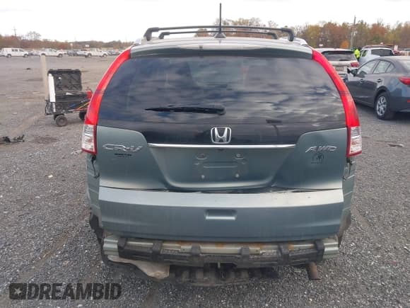 ✅ 2012 Honda CR-V EX-L • VIN: 2HKRM4H77CH623885 • Lot: 43570793. Listed on IAAI with 219,378 mi. Free auction sales archive from the USA and detailed vehicle history report at DreamBid. Image 16.