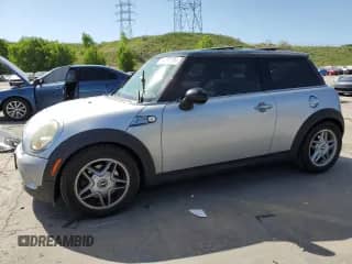 2007 MINI Hardtop S with VIN WMWMF73577TT81819, listed as a Copart auction lot 61069295 with Not provided miles and Salvage title. Bid and sale history available at DreamBid. Image 1.
