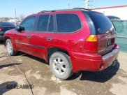 ✅ 2006 GMC Envoy SLT • VIN: 1GKDT13S662189377 • Lot: 42106602. Listed on IAAI with 156,391 mi. Free auction sales archive from the USA and detailed vehicle history report at DreamBid. Image 3.