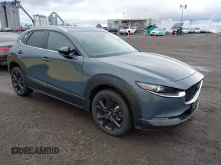 ✅ 2023 Mazda CX-30 Premium • VIN: 3MVDMBDY5PM519388 • Lot: 43611018. Listed on IAAI with 16,512 mi. Free auction sales archive from the USA and detailed vehicle history report at DreamBid. Image 1.