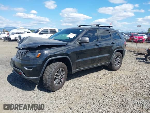 2017 Jeep Grand Cherokee Trailhawk with VIN 1C4RJFLT7HC754925, listed as a IAAI auction lot 43018651 with 118,604 mi miles and . Bid and sale history available at DreamBid. Image 17.