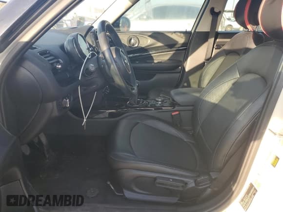 ✅ 2016 MINI Clubman • VIN: WMWLN5C51G2B34811 • Lot: 76921014. Listed on Copart with 75,659 mi. Free auction sales archive from the USA and detailed vehicle history report at DreamBid. Image 7.