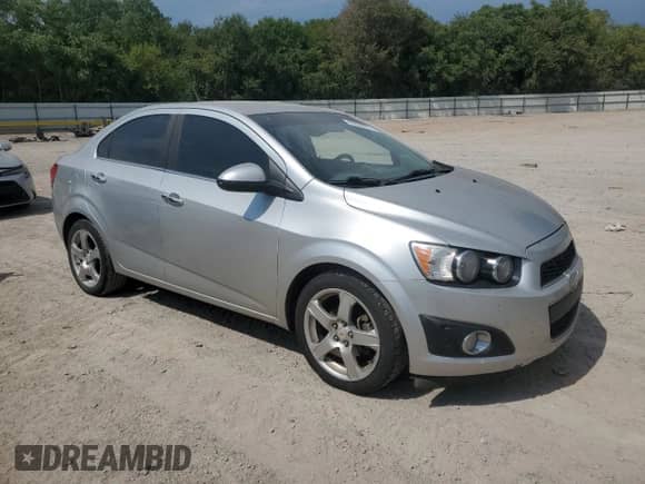 2012 Chevrolet Sonic LTZ с VIN 1G1JE5SH8C4108328, выставлен на аукционе Copart как лот 80509915 с пробегом 111 625 миль миль и Списание • Salvage title. История ставок и продаж доступна на DreamBid. Изображение 4.