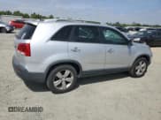 ✅ 2013 Kia Sorento EX • VIN: 5XYKUDA23DG411929 • Lot: 54327335. Listed on Copart with 141,926 mi. Free auction sales archive from the USA and detailed vehicle history report at DreamBid. Image 3.