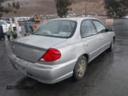 ✅ 2003 Kia Spectra • VIN: KNAFB121135297834 • Лот: 42409441. Опубликован ранее на IAAI с пробегом 84 621 миль. Бесплатный доступ к архиву аукционных продаж из США и подробный отчёт об истории автомобиля на DreamBid. Изображение 4.