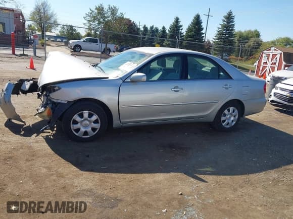 ✅ 2004 Toyota Camry LE • VIN: 4T1BE30K74U861439 • Lot: 43380963. Listed on IAAI with 135,892 mi. Free auction sales archive from the USA and detailed vehicle history report at DreamBid. Image 14.