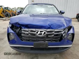 ✅ 2022 Hyundai Tucson SE • VIN: 5NMJACAE3NH020585 • Lot: 62921983. Wystawiony na Copart z przebiegiem 25 903 mil. Bezpłatny archiwum sprzedaży aukcyjnych z USA i szczegółowy raport historii pojazdu na DreamBid. Zdjęcie 5.