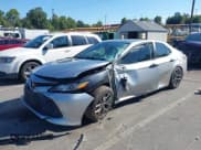 ✅ 2020 Toyota Camry LE • VIN: 4T1C11AKXLU943909 • Лот: 43185427. Опубликован ранее на IAAI с пробегом 116 766 миль. Бесплатный доступ к архиву аукционных продаж из США и подробный отчёт об истории автомобиля на DreamBid. Изображение 2.