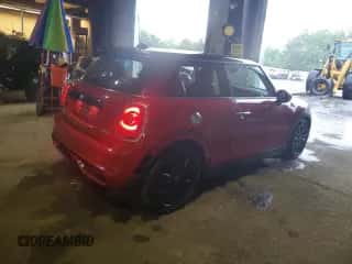 2014 MINI Hardtop S with VIN WMWXM7C54ET986641, listed as a Copart auction lot 62822075 with 80,904 mi miles and Salvage title. Bid and sale history available at DreamBid. Image 3.