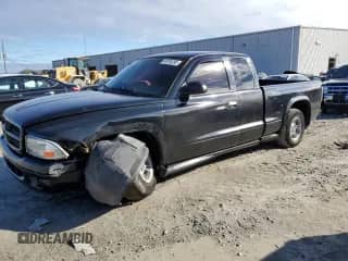 1998 Dodge Dakota SLT z VIN 1B7GL22Y1WS623757, wystawiony jako Copart lot #41874295 z przebiegiem Nie podano mil oraz Szkoda całkowita • Salvage title. Historia ofert i sprzedaży dostępna na DreamBid. Obrazek 1.
