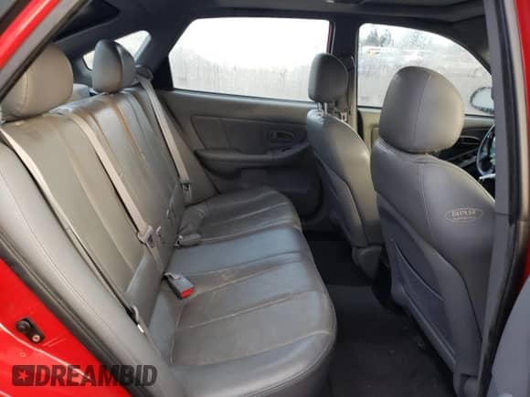 2004 Hyundai Elantra GT z VIN KMHDN56D34U104583, wystawiony jako Copart lot #82441094 z przebiegiem Nie podano mil oraz Szkoda całkowita • Salvage title. Historia ofert i sprzedaży dostępna na DreamBid. Obrazek 10.