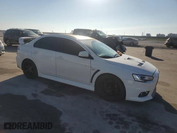 ✅ 2014 Mitsubishi Lancer Evolution GSR • VIN: JA32W8FV5EU023703 • Lot: 72744504. Listed on Copart with Not provided. Free auction sales archive from the USA and detailed vehicle history report at DreamBid. Image 4.
