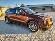 ✅ 2019 Cadillac XT4 FWD Luxury • VIN: 1GYAZAR48KF112545 • Lot: 93889225. Listed on Copart with 49,753 mi. Free auction sales archive from the USA and detailed vehicle history report at DreamBid. Image 4.
