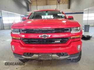 ✅ 2017 Chevrolet Silverado 1500 LT • VIN: 3GCUKREC6HG345317 • Lot: 91011945. Wystawiony na Copart z przebiegiem 164 709 mil. Bezpłatny archiwum sprzedaży aukcyjnych z USA i szczegółowy raport historii pojazdu na DreamBid. Zdjęcie 5.