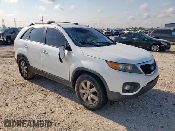 ✅ 2012 Kia Sorento LX • VIN: 5XYKT3A66CG255867 • Lot: 67977275. Listed on Copart with 218,065 mi. Free auction sales archive from the USA and detailed vehicle history report at DreamBid. Image 4.