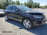 ✅ 2013 Volkswagen Touareg Lux • VIN: WVGEF9BP0DD001565 • Lot: 63070845. Listed on Copart with 123,788 mi. Free auction sales archive from the USA and detailed vehicle history report at DreamBid. Image 4.