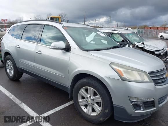 ✅ 2014 Chevrolet Traverse LT • VIN: 1GNKRHKD2EJ121683 • Lot: 43782251. Listed on IAAI with 167,147 mi. Free auction sales archive from the USA and detailed vehicle history report at DreamBid. Image 1.