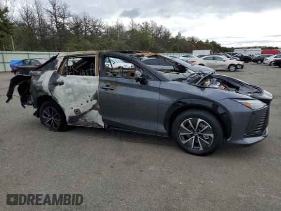 ✅ 2024 Lexus RZ 450e Premium • VIN: JTJAAAAB1RA026330 • Lot: 73341264. Wystawiony na Copart z przebiegiem Nie podano. Bezpłatny archiwum sprzedaży aukcyjnych z USA i szczegółowy raport historii pojazdu na DreamBid. Zdjęcie 4.