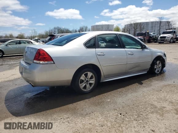 ✅ 2014 Chevrolet Impala LS • VIN: 2G1WA5E3XE1176405 • Lot: 54516115. Listed on Copart with 156,271 mi. Free auction sales archive from the USA and detailed vehicle history report at DreamBid. Image 3.