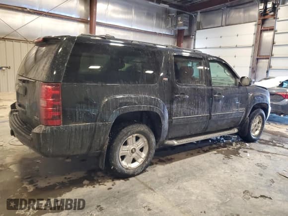 ✅ 2011 Chevrolet Suburban • VIN: MI0206A381N062111 • Lot: 43635065. Listed on Copart with 164,599 mi. Free auction sales archive from the USA and detailed vehicle history report at DreamBid. Image 3.