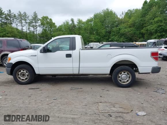 ✅ 2012 Ford F-150 XL • VIN: 1FTMF1CM1CKE01795 • Lot: 42307760. Listed on IAAI with 124,659 mi. Free auction sales archive from the USA and detailed vehicle history report at DreamBid. Image 14.