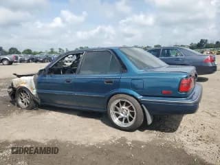 ✅ 1992 Toyota Corolla • VIN: 2T1AE94A3NC128632 • Lot: 64432285. Listed on Copart with Not provided. Free auction sales archive from the USA and detailed vehicle history report at DreamBid. Image 2.