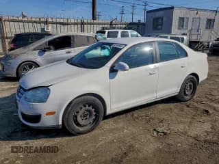✅ 2010 Volkswagen Jetta S • VIN: 3VWJZ7AJ6AM064274 • Lot: 94191905. Listed on Copart with 66,910 mi. Free auction sales archive from the USA and detailed vehicle history report at DreamBid. Image 1.