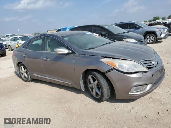 2013 Hyundai Azera z VIN KMHFG4JG4DA217863, wystawiony jako Copart lot #53840575 z przebiegiem Nie podano mil oraz Czysty tytuł • Clean title. Historia ofert i sprzedaży dostępna na DreamBid. Obrazek 4.