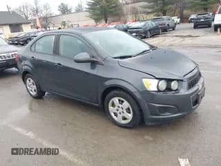 ✅ 2014 Chevrolet Sonic LS • VIN: 1G1JA5SH2E4130677 • Lot: 43812042. Listed on IAAI with 156,820 mi. Free auction sales archive from the USA and detailed vehicle history report at DreamBid. Image 1.