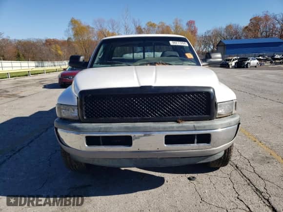 1999 Dodge 1500 с VIN 3B7HF13Z7XG136326, выставлен на аукционе Copart как лот 80277284 с пробегом Не указан миль и Списание • Salvage title. История ставок и продаж доступна на DreamBid. Изображение 5.
