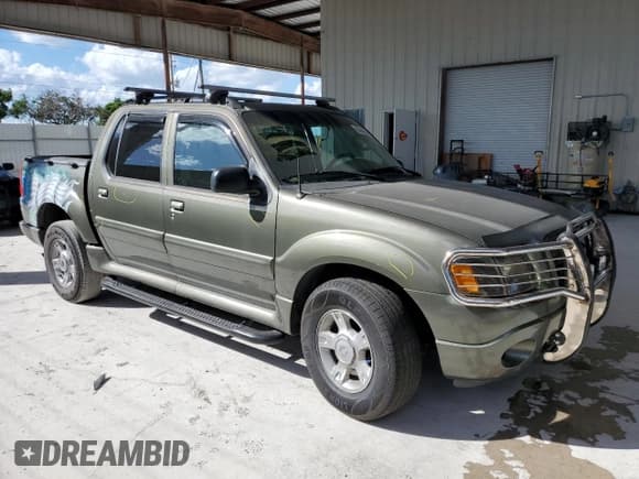 ✅ 2004 Ford Explorer Sport Trac XLS • VIN: 1FMZU67K34UB65119 • Lot: 89664985. Listed on Copart with 221,782 mi. Free auction sales archive from the USA and detailed vehicle history report at DreamBid. Image 4.