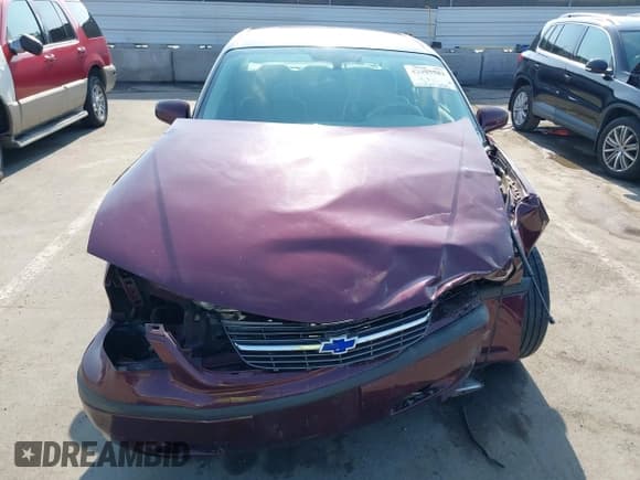 ✅ 2004 Chevrolet Impala • VIN: 2G1WF52E849397525 • Lot: 42903583. Listed on IAAI with 152,465 mi. Free auction sales archive from the USA and detailed vehicle history report at DreamBid. Image 12.