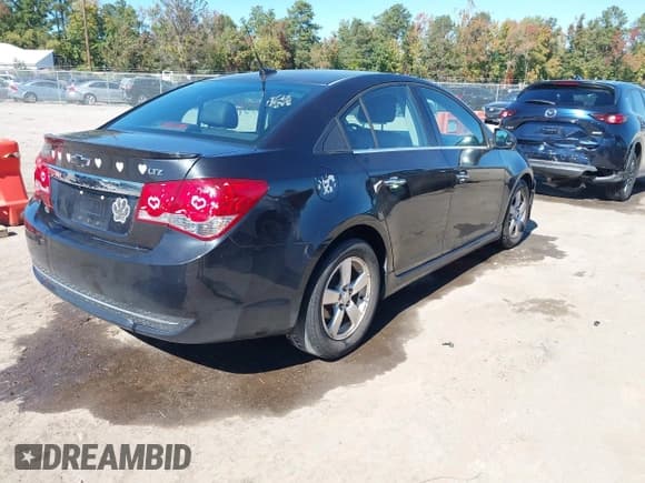 ✅ 2014 Chevrolet Cruze LTZ • VIN: 1G1PG5SB1E7163625 • Lot: 43460823. Listed on IAAI with 198,312 mi. Free auction sales archive from the USA and detailed vehicle history report at DreamBid. Image 4.