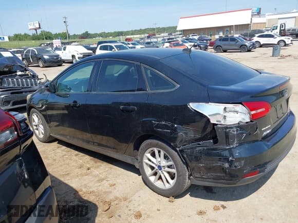 ✅ 2018 Ford Focus SE • VIN: 1FADP3FE8JL281651 • Lot: 43169650. Listed on IAAI with 69,451 mi. Free auction sales archive from the USA and detailed vehicle history report at DreamBid. Image 14.