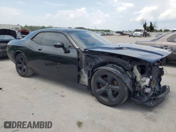 2012 Dodge Challenger SXT z VIN 2C3CDYAG7CH269659, wystawiony jako Copart lot #66377564 z przebiegiem 124 426 mil mil oraz Czysty tytuł • Clean title. Historia ofert i sprzedaży dostępna na DreamBid. Obrazek 4.