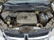 ✅ 2014 Dodge Grand Caravan SE • VIN: 2C4RDGBG4ER475825 • Lot: 86154295. Wystawiony na Copart z przebiegiem 174 310 mil. Bezpłatny archiwum sprzedaży aukcyjnych z USA i szczegółowy raport historii pojazdu na DreamBid. Zdjęcie 12.