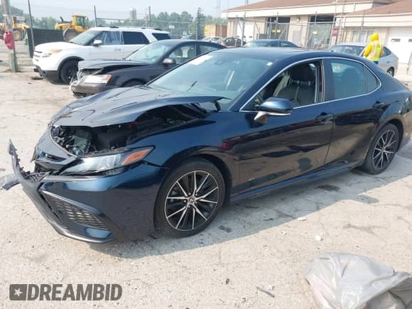 2021 Toyota Camry SE with VIN 4T1T11BKXMU042040, listed as a IAAI auction lot 42879951 with 35,130 mi miles and . Bid and sale history available at DreamBid. Image 17.
