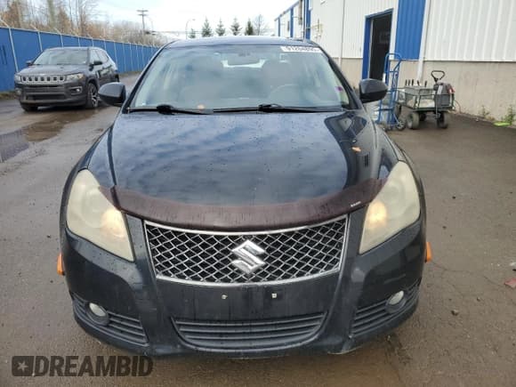 ✅ 2012 Suzuki Kizashi SE • VIN: JS2RF9A32C6100580 • Лот: 91204895. Опубликован ранее на Copart с пробегом 173 714 миль. Бесплатный доступ к архиву аукционных продаж из США и подробный отчёт об истории автомобиля на DreamBid. Изображение 5.